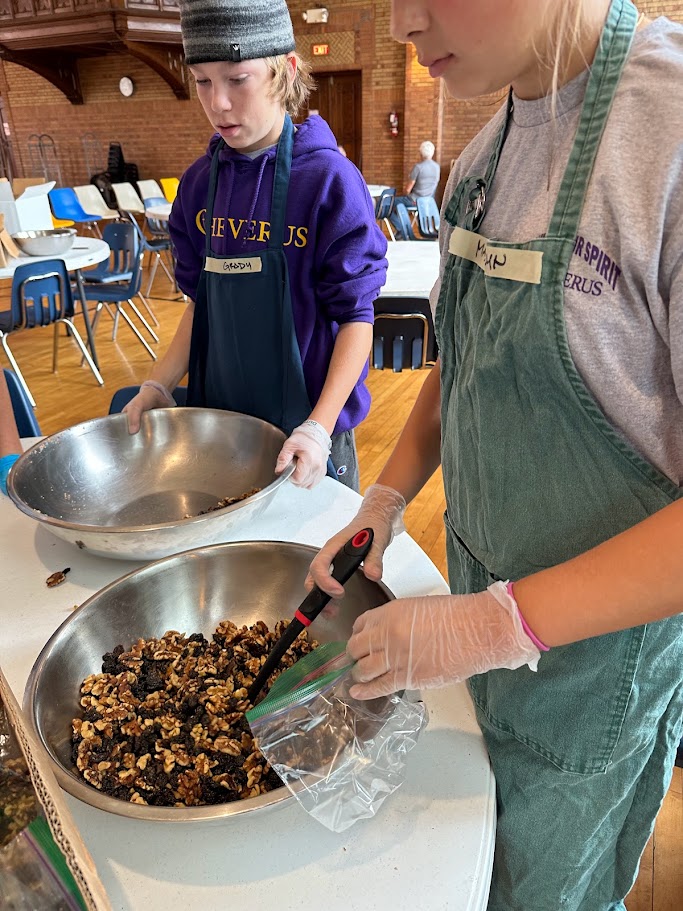 students volunteering and prepping food
